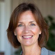 Portrait of Dr. Elara Vance, smiling confidently.
